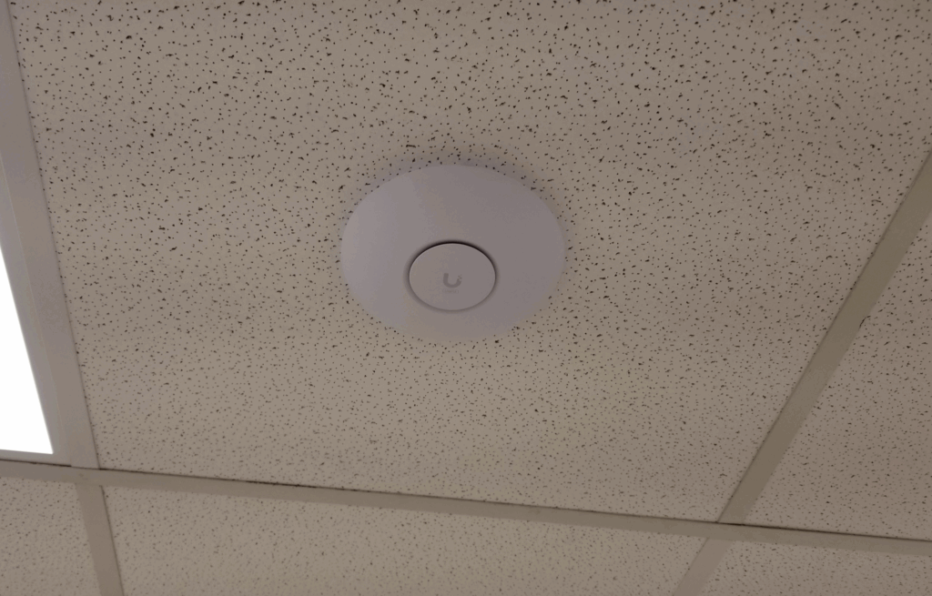 Ceiling-mounted Wi-Fi access point installed by Digital Systems Integration in Melbourne FL